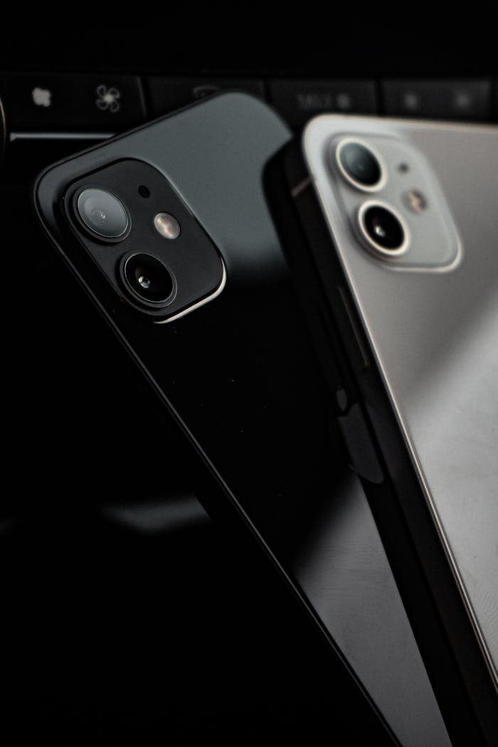 services-03 Close-up shot of two stylish smartphones highlighting modern technology.